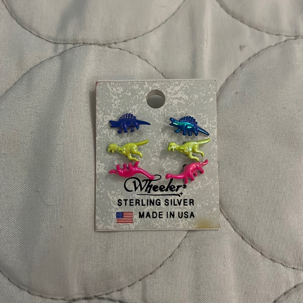 Claire’s Dinosaur earrings